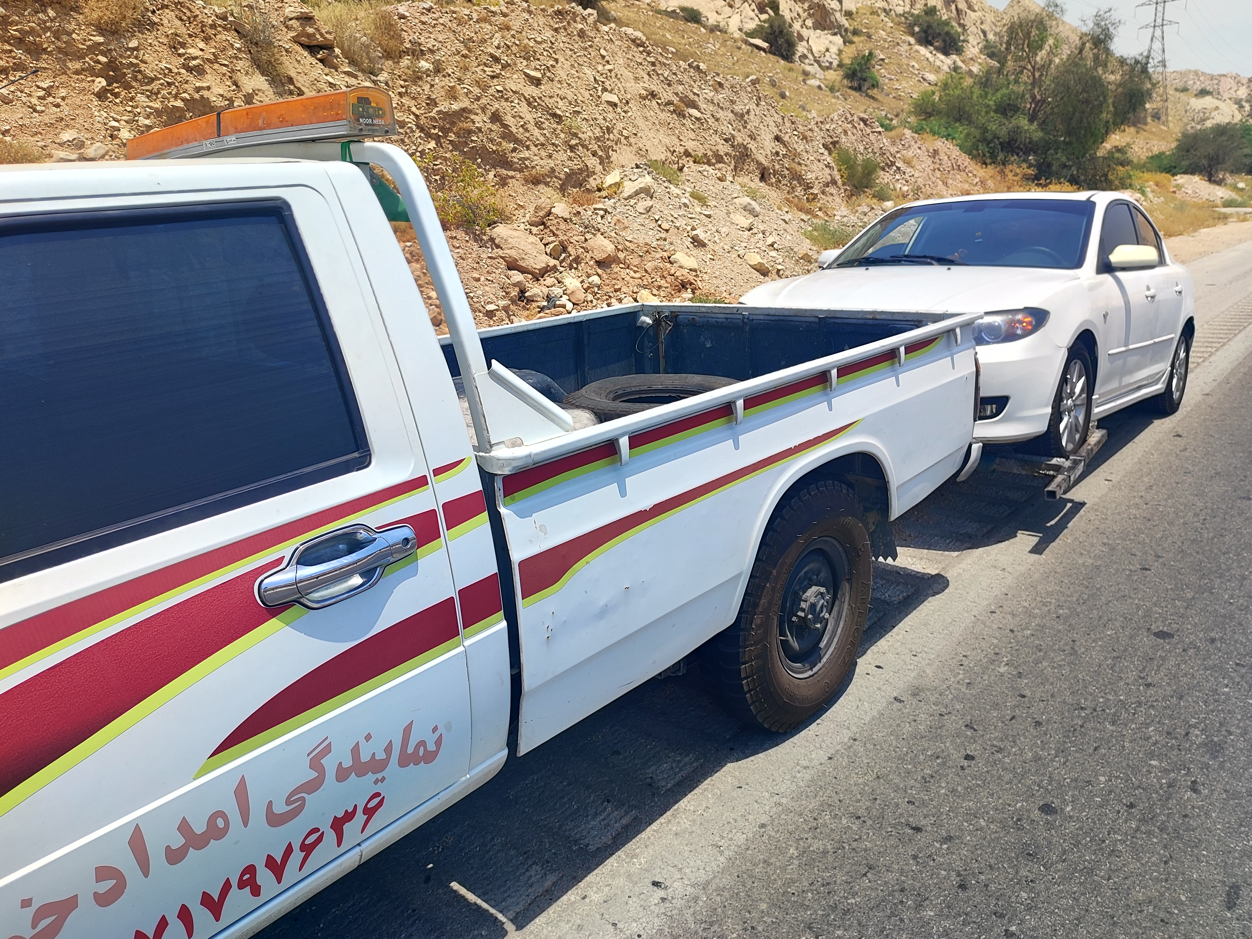 امداد خودرو . یدکش چرخگیر سیراف.کنگان.جم
